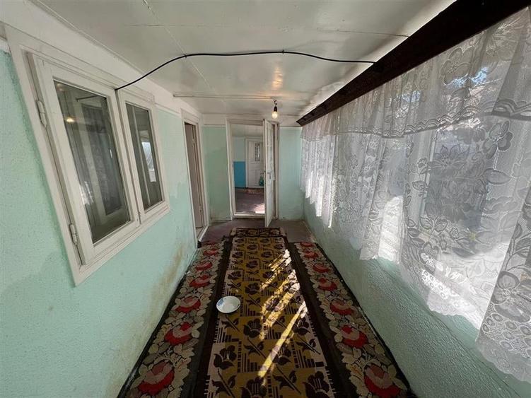 Casa batraneasca + teren 1881 mp de vanzare in Sat Milcovul - 11