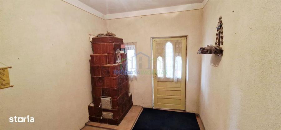 Casa Bradesti , teren intravilan 7952 mp , deschidere 33 m la DE 70 - 10