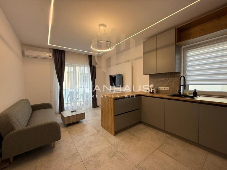 Inchiriere-ultramodern apartament zona rezidentiala ,3 camere,etaj 1,loc de parc - 1