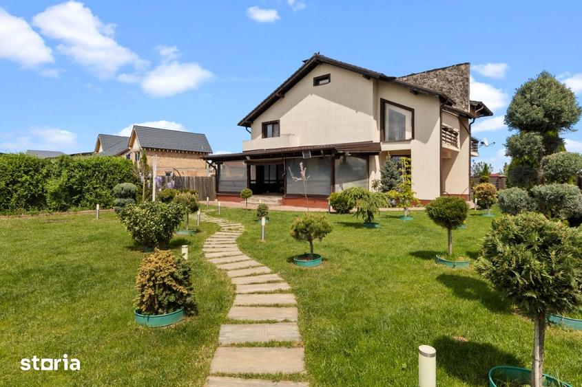 Casă cu 5 camere cu Teren 1644 Mp în Sânpetru
