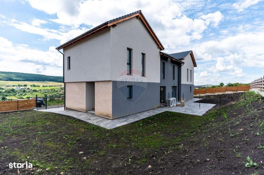 Casă cu 4 camere în Chinteni