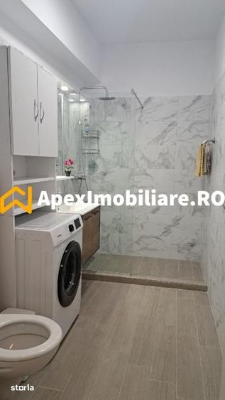 Garsonieră decomandată în Titan