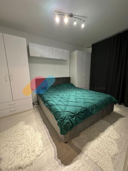 Apartament cu 2 camere semidecomandat, mobilat în Chinteni