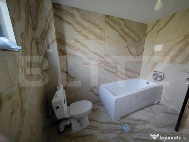 Casa cu 4 camere, 105 mp utili, cu garaj si 500 mp teren, zo - 5