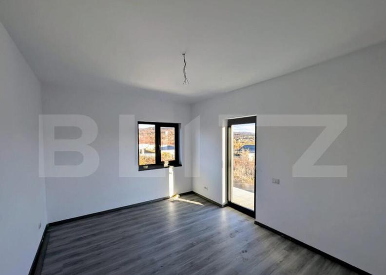 Casa moderna situata intr-o zona linistita, cu acces facil l - 7