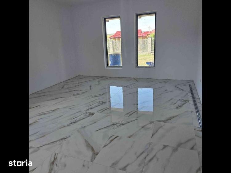 Casă cu 4 camere cu Teren 500 Mp în Central