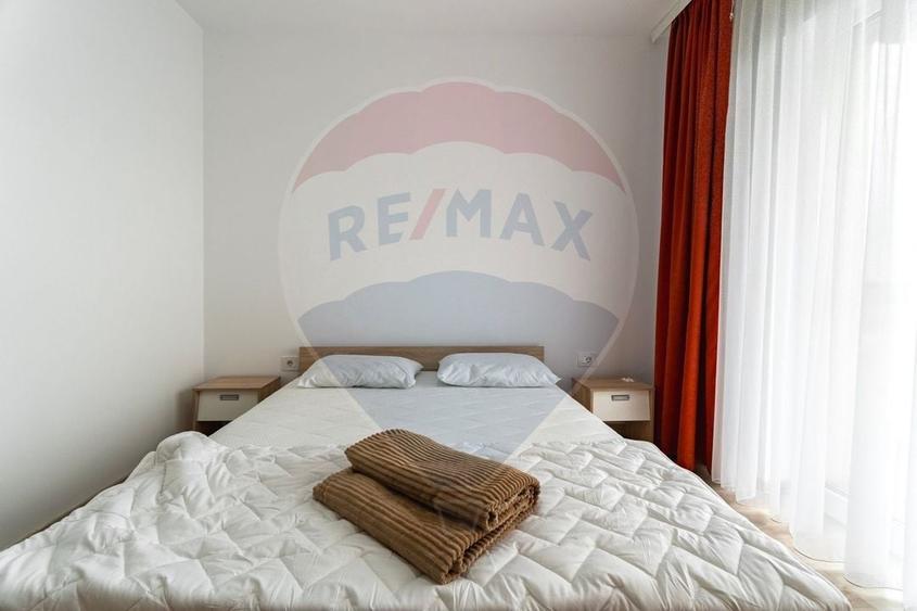 Apartament cu 2 camere semidecomandat, mobilat în Blumăna
