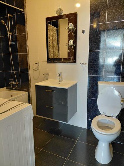 Apartament 3 camere,2 balcoane,parcare str.Florilor - 10