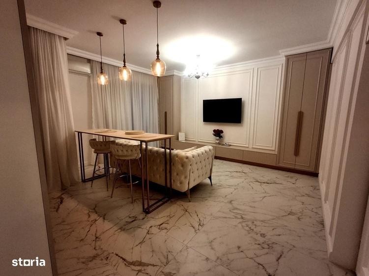 Apartament cu 2 camere, mobilat în Central