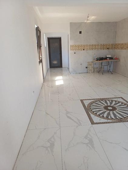 Casă cu Teren 100 Mp în Central
