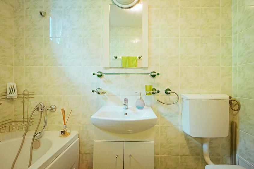 Casă individuală cu 4 camere decomandat cu Canalizare în Sânpetru