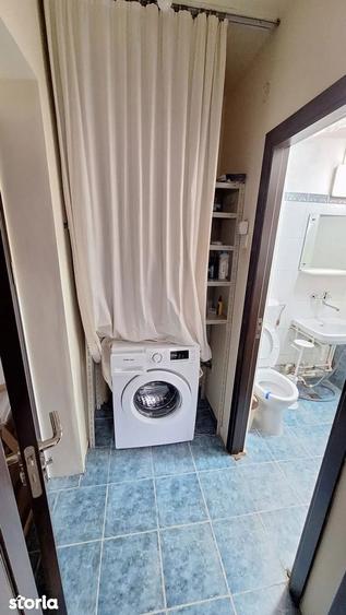 Apartament cu 3 camere semidecomandat în Calea București