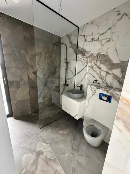 Casă individuală cu 4 camere cu Teren 390 Mp în Tunari