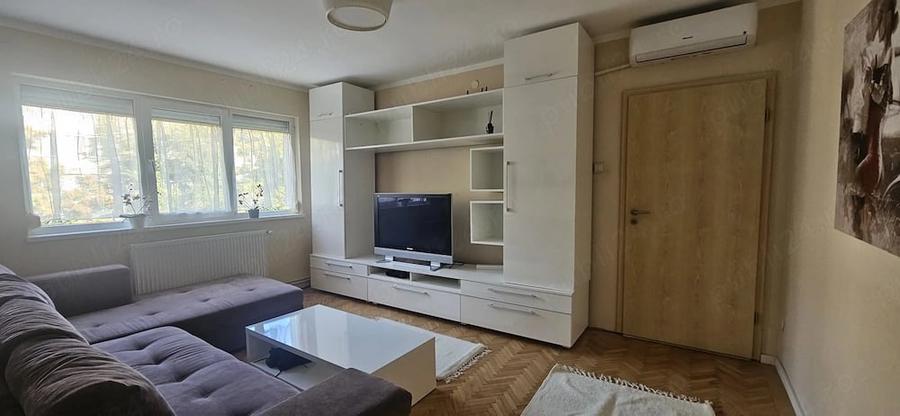 Apartament cu 3 camere semidecomandat în Olimpia-Stadion