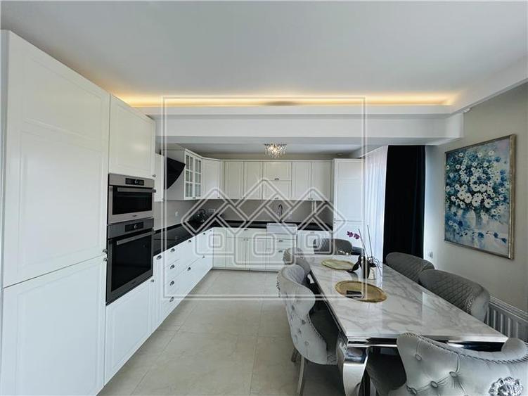 Ap pe 2 niveluri, 75 mp utili + 2 balcoane, mobilat modern - 3