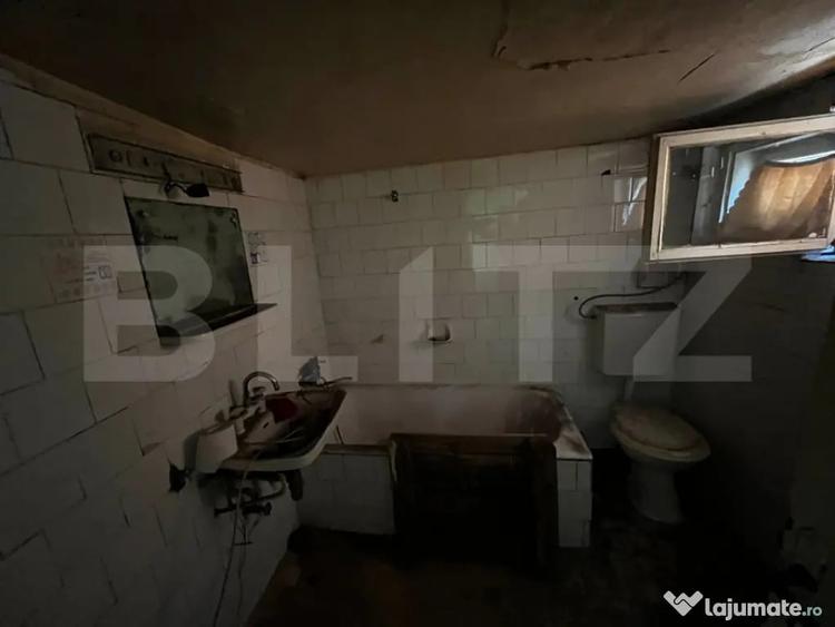 Casă cu 4 camere cu Teren 3300 Mp în Central