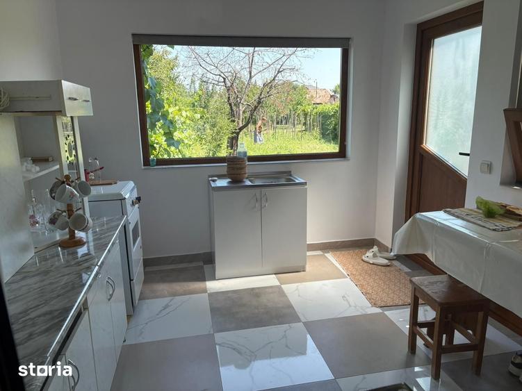 Casă cu 2 camere cu Teren 1100 Mp în Oituz