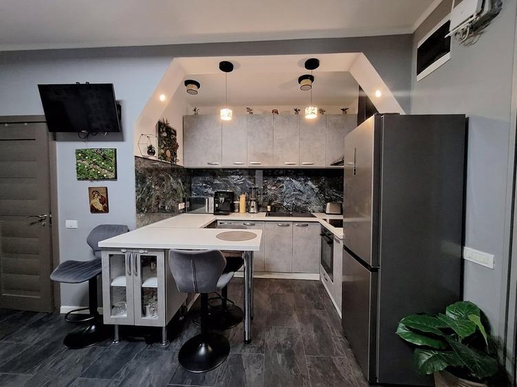 Apartament cu 2 camere semidecomandat, mobilat în Take Ionescu