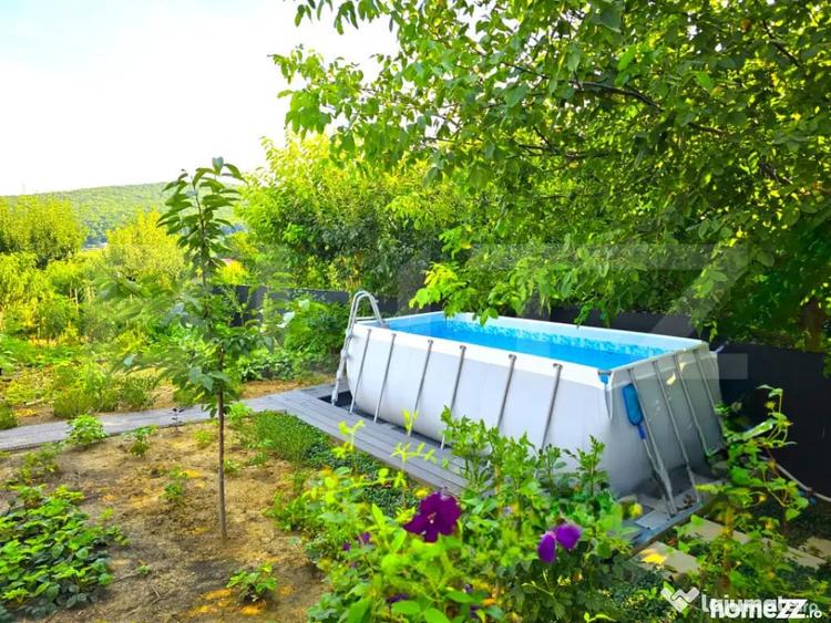 Casă cu 5 camere cu Teren 1000 Mp în Bucium