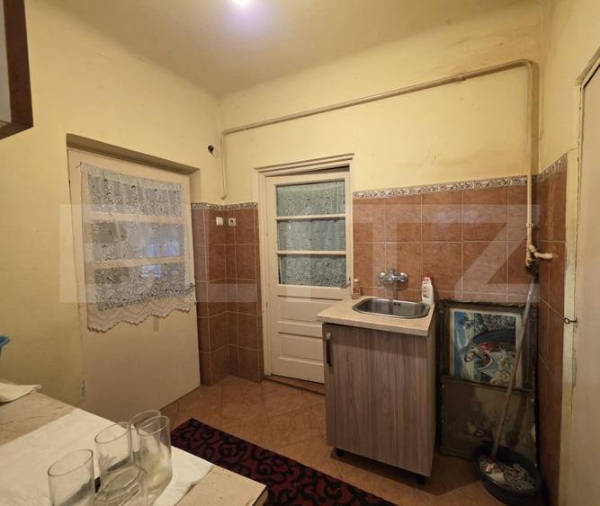 Casă individuală cu 4 camere cu Canalizare în Titulescu