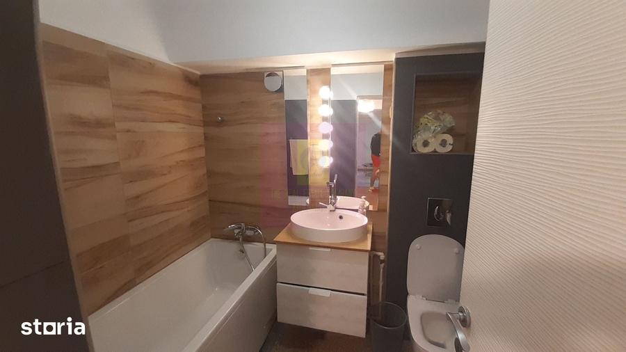 Apartament cu 3 camere în Romană