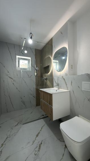 Apartament cu 3 camere decomandat în Dâmbovița