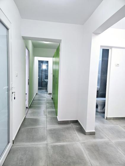 Apartament 3 camere de inchiriat - la parter- SPATIU BIROURI - 12