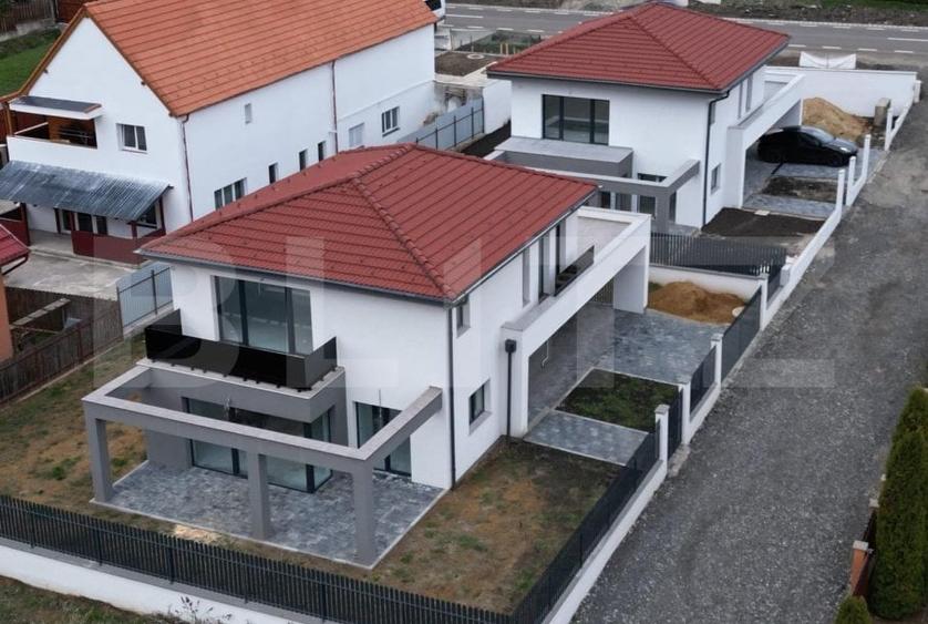 Casa individuala moderna, cu garaj, la intrare in Chinteni - 1