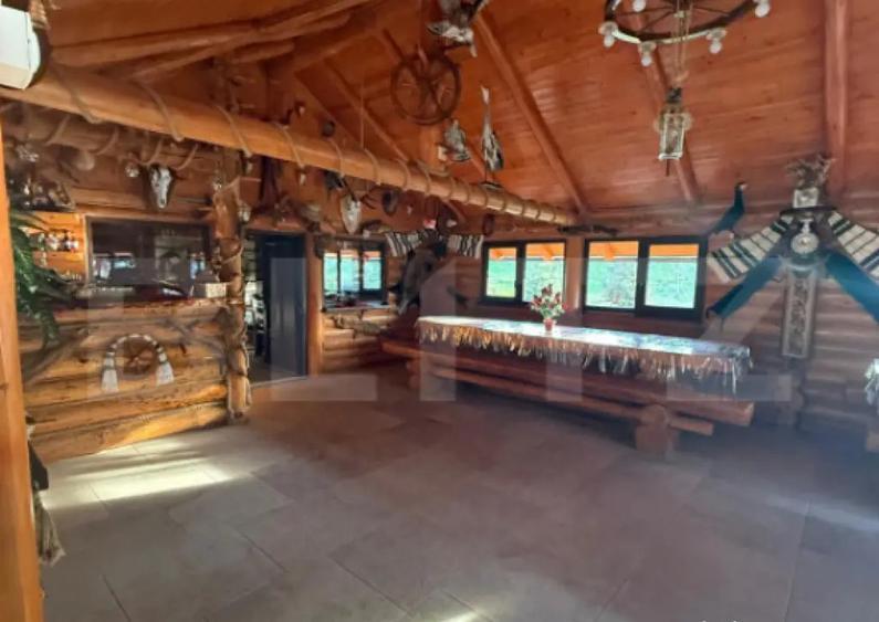 Cabana din lemn rotund, 2 camere, 140 mp, teren 2800 mp, Pal - 14