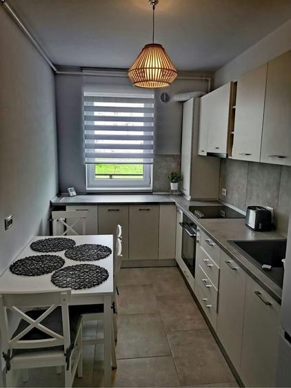 Apartament cu 2 camere decomandat în Tractorul