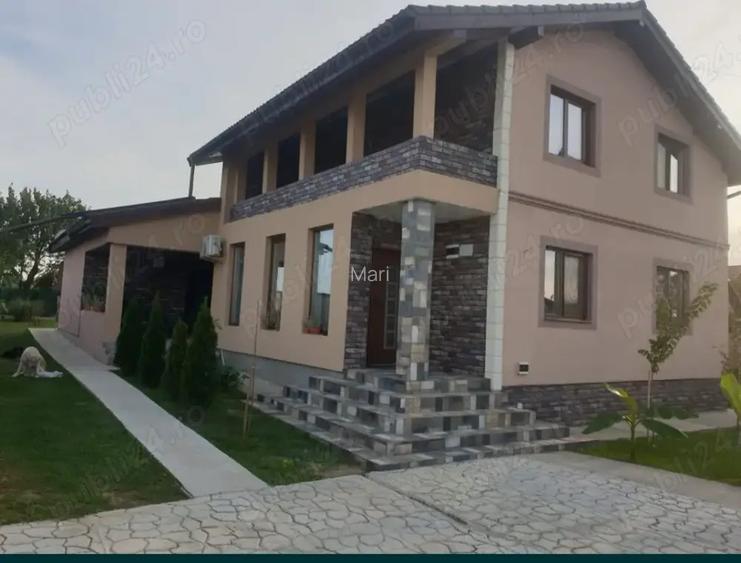 Vand casa individuala