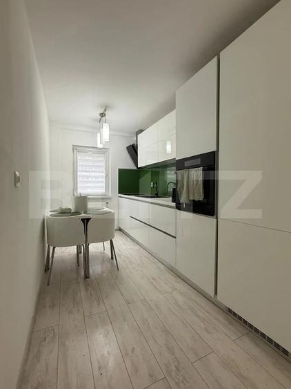 Apartament 3 camere, 2 bai, decomandat, etaj intermediar, boxa - 1