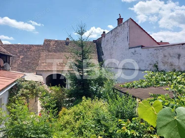 Casa 214 mp utili singur in curte 800 mp teren zona centrala Cisnadie - 16