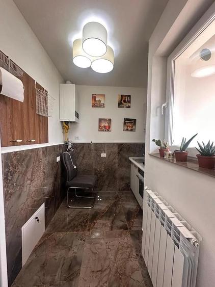 De vanzare casa construita din caramida, renovata, mobilata ?i utilata, zona Parcului 79.000euro - 10