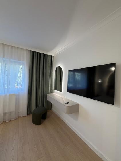 Apartament renovat complet,totul nou,centrala proprie,lângă Bd Unirii - 11