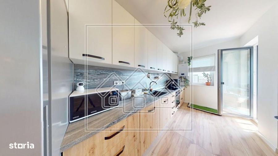 Apartament spatios, 2 bai, balcon mare, loc de parcare inclus - 13