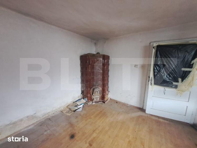 Casă cu 2 camere cu Teren 1400 Mp în Central