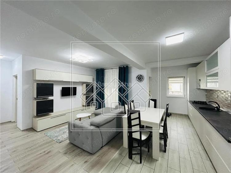 Ap spatios, cu 3 camere, 2 balcoane, etaj 1 3, loc de parcare-Selimbar