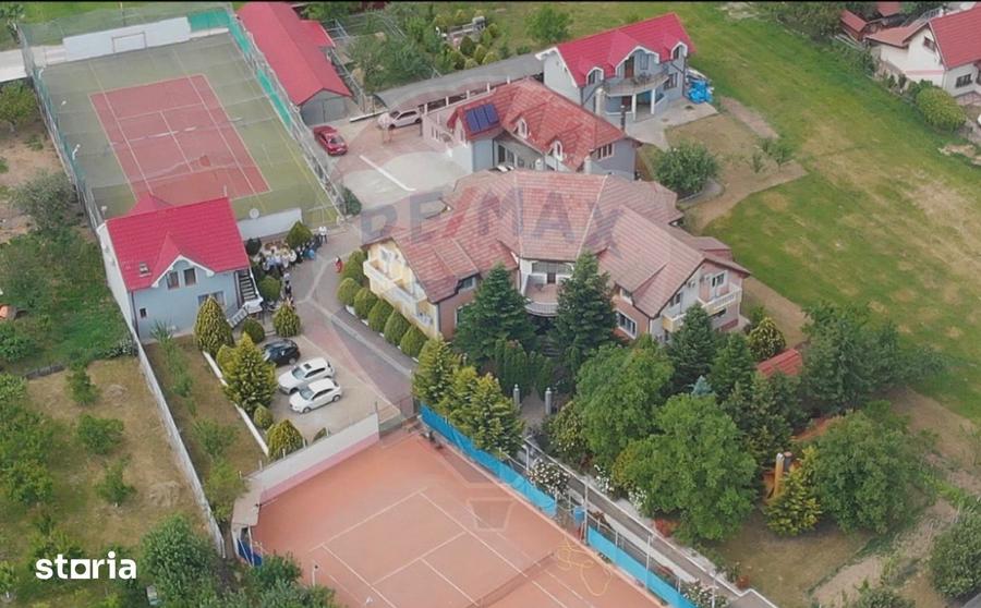 Casă cu Teren 5375 Mp în Sânmartin