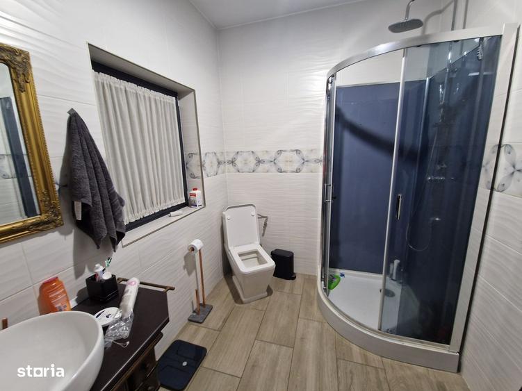 Casă cu 4 camere cu Teren 450 Mp în Tunari
