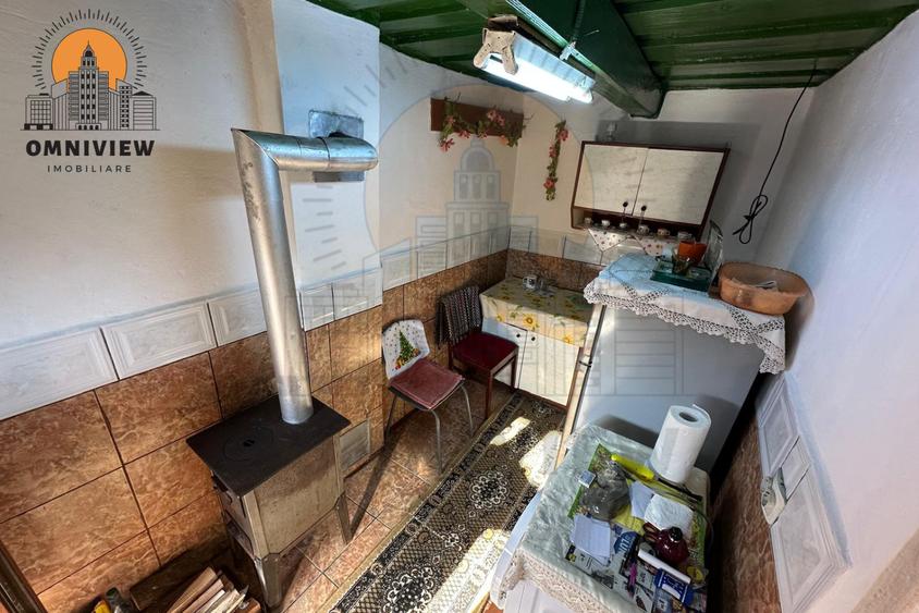 Casă cu teren mare în Ormeniș, lângă râu – la 30 km de Brașov - 8