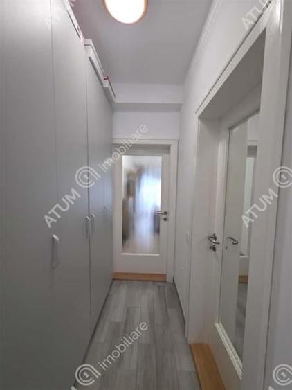 Garsoniera decomandata cu balcon si parcare in zona DaVinci din Sibiu - 13