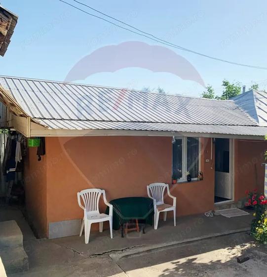 Casă cu Teren 1043 Mp în Dochia
