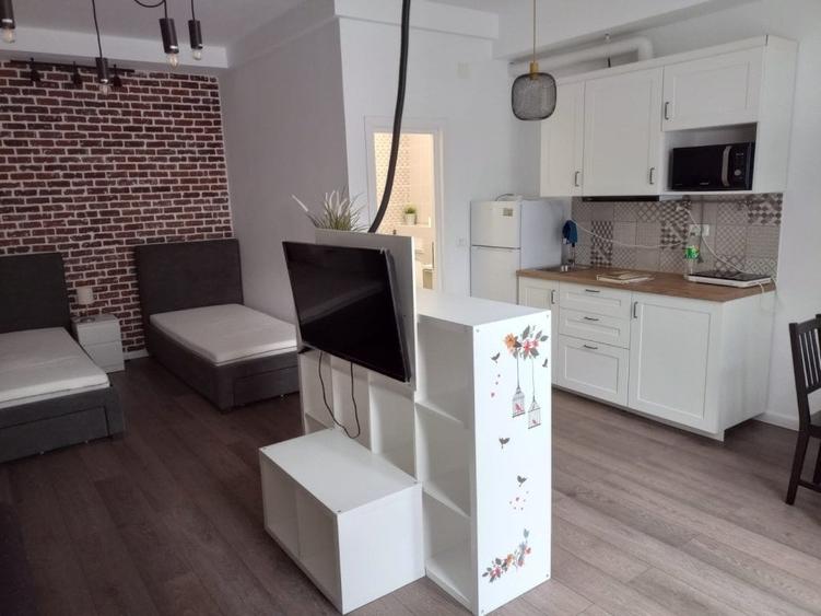 Închiriere Apartament Studio Modern – Zonă Centrală - curte interioara 450 Eur - 1
