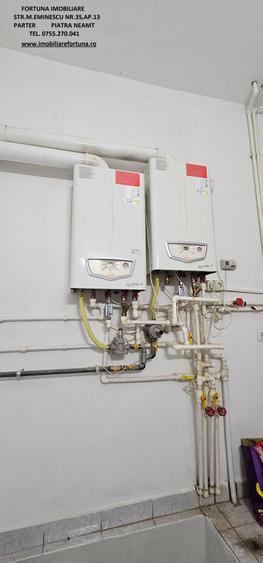 Locuinta individuala(apartament 4 camere)+spatiu comercial si teren ,Darmanesti - 17