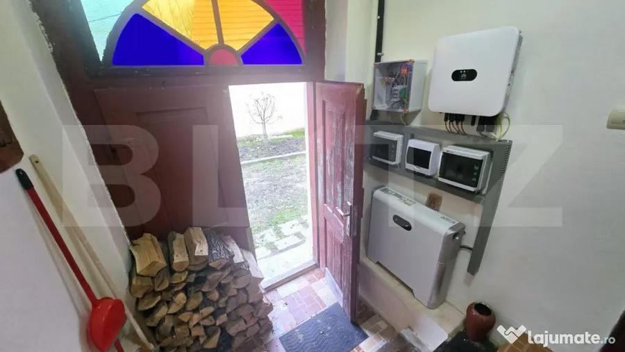 Casa individuala cu doua camere,60 mp utili, 500 mp teren, C - 11