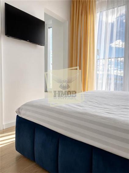 Penthouse cu 3 camere semidecomandat, mobilat în Industrial Est