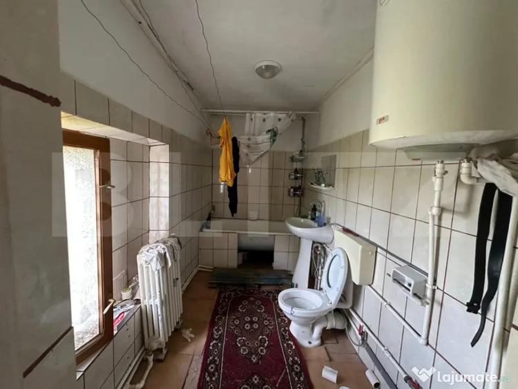 Casă cu 3 camere cu Teren 1500 Mp în Bucium