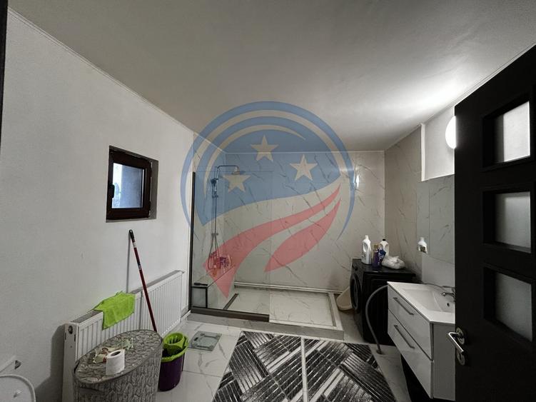 Casă spațioasă P+1+M pe teren de 902 mp – ideală pentru familie - 10