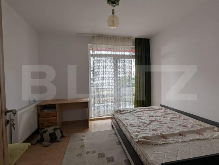 Apartament cu 3 camere semidecomandat, mobilat în Baciu